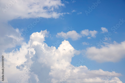 Blue sky with white clouds. Background.