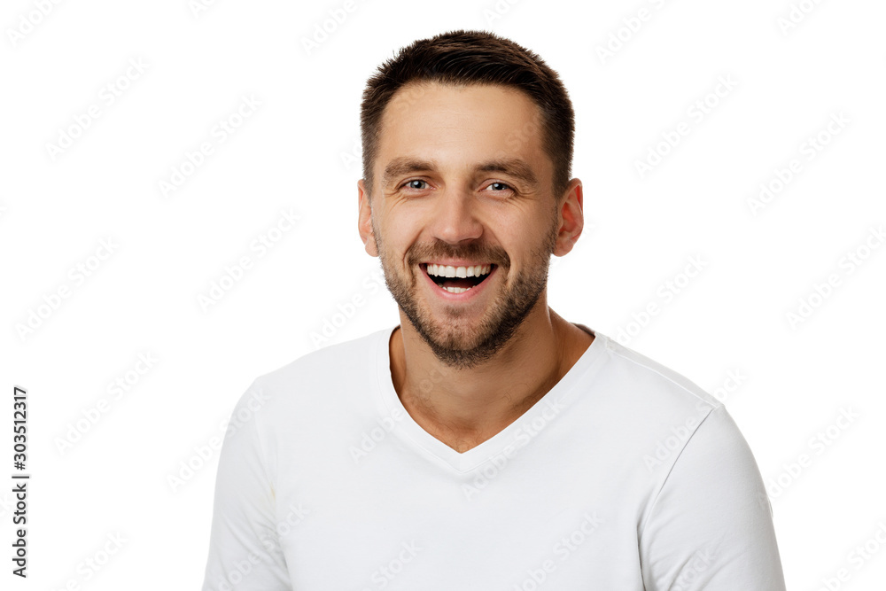 Φωτογραφία Close-up portrait of smiling handsome bearded man in white shirt looking at came