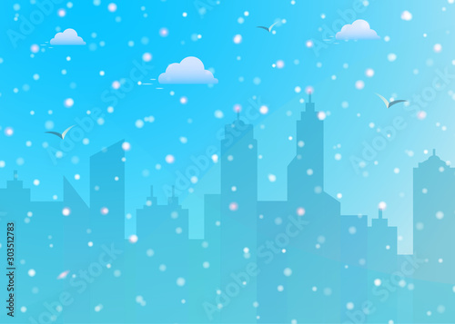 Snowfall winter christmas on city landscape background, blue sky with clouds, colorful falling snow and snowflakes. Design element for Merry Christmas and Happy New Year greeting card..