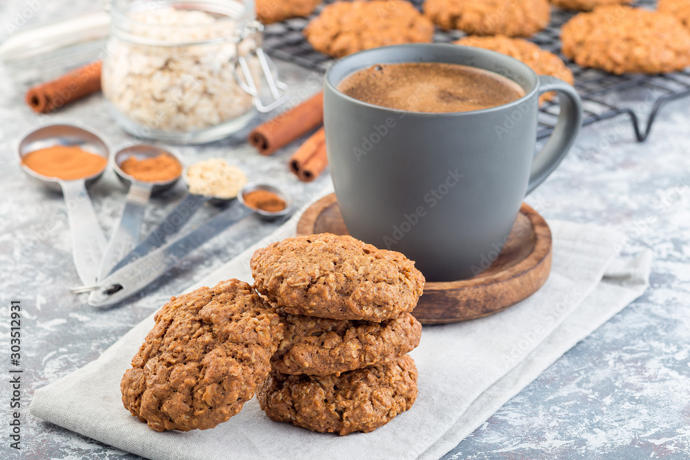 Spicy pumpkin and oatmeal cookies with  cup of coffee, horizontal