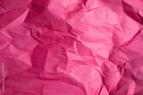 Old crumpled pink paper texture