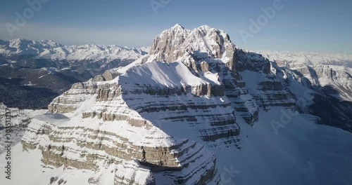 Aerial view of Groste mountain, Dolomites, Alps, Brenta Group, peak in winter, an aerial view in a sunny day