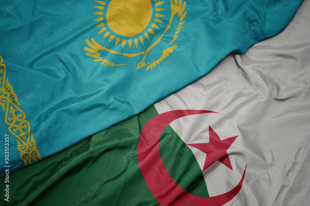 waving colorful flag of algeria and national flag of kazakhstan.