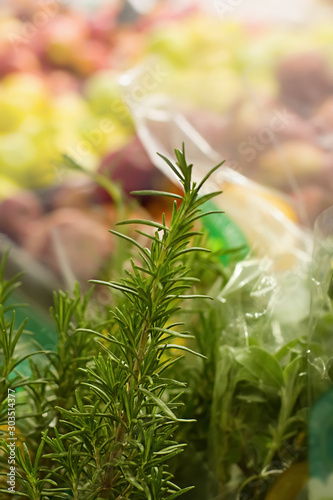 Rosmarin at supermarket. Concept of healthy food  bio  vegetarian  diet.