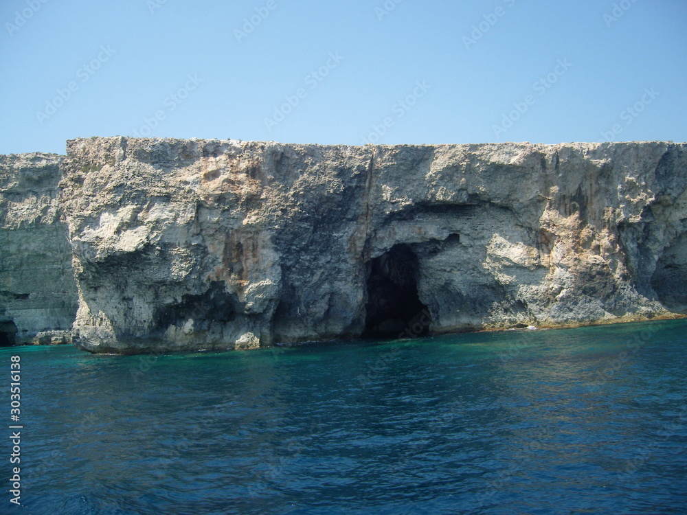 Malta coastal steep area with caves