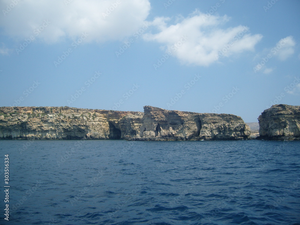 Fotografie Malta coastal area with steep rocks