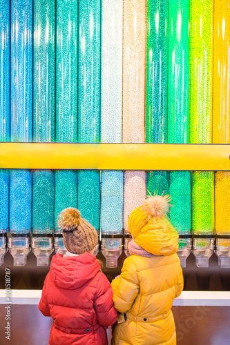 Famous M&M Candies at candy dispenser machines in the Times Square shop in New York photo