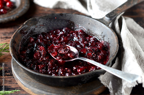 Cranberry sauce in a pan, christmas, rustic