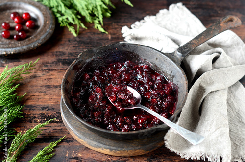 Cranberry sauce in a pan, christmas, rustic