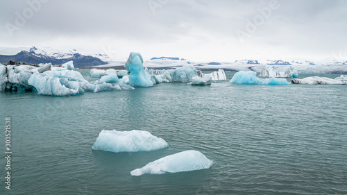 View of icebergs in Jokulsarlon glacier lagoon formed with melting ice, Iceland