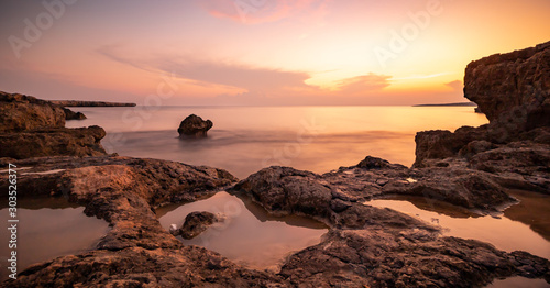 sunset on a rocky coast