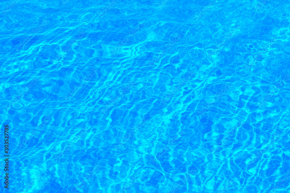 The texture of the water in the pool azure, background