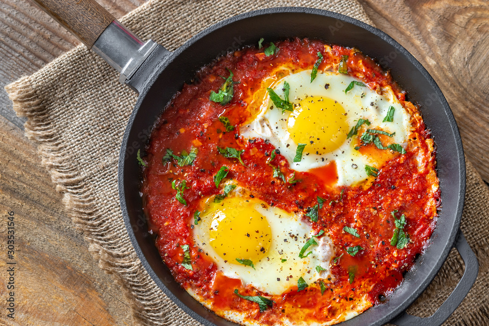 Shakshouka served in a frying pan Shakshouka served in a frying pan
