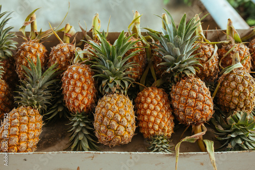 Yellow Pineaple on the Market in Asia photo