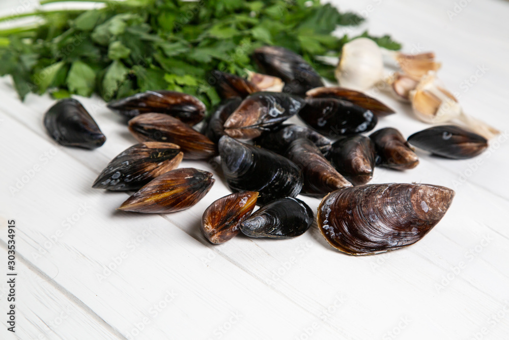 Cook ingredients fresh raw mussels with parsley and garlic Cook ingredients fresh raw mussels with parsley and garlic