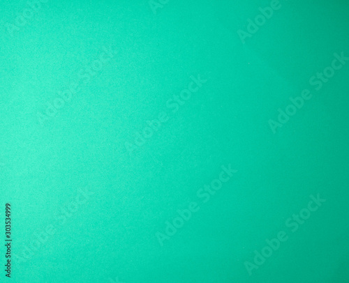 green paper background from thick paper, full frame
