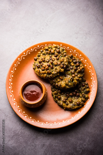 Chana Dal Bhabra / Babra served with tomato ketchup, popular food from Bihar / Bhojpur of India photo