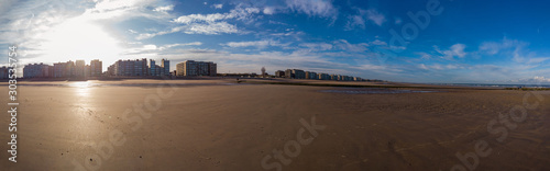 panorama of sand on the beach in a warm autumnal sunlight © fotografiemahieu