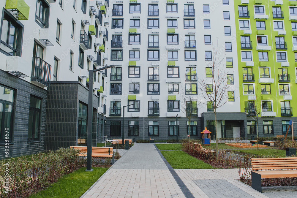 Obraz na plátně new residential quarter of new buildings: a modern playground in the courtyard o