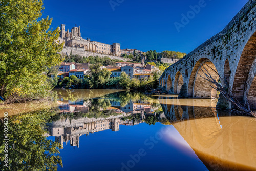 The Old Bridge (Pont Vieux) and the St. Nazaire Cathedral at Beziers, Herault Department, France in autumn