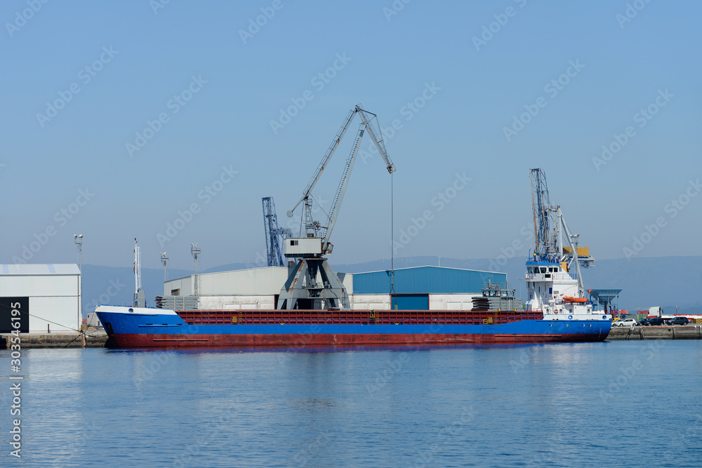 port cranes and cargo tanker in port