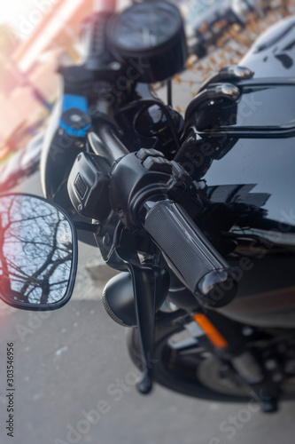 handle on the handlebars of a motorcycle close-up