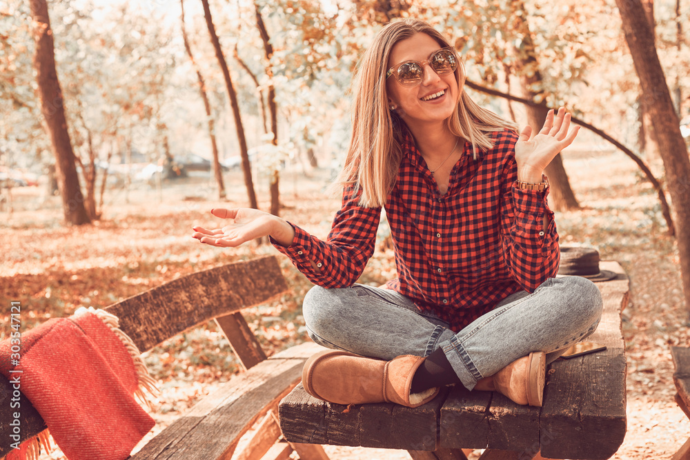 Portrait of beautiful attractive woman enjoying and posing in autumn day. Portrait of beautiful attractive woman enjoying and posing in autumn day.