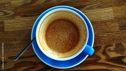 blue cup with leftover coffee