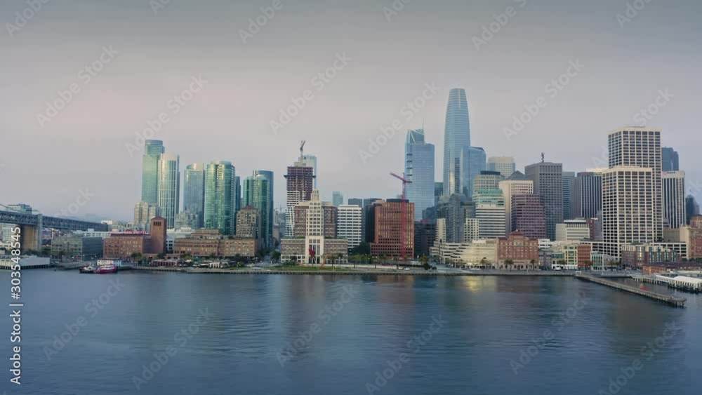 Aerial: San Francisco embarcadero & city skyline at sunrise. California, USA. Aerial: San Francisco embarcadero & city skyline at sunrise. California, USA.