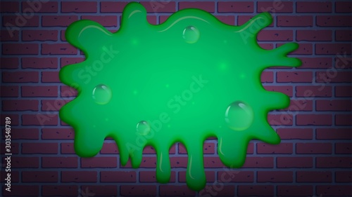 Green slime on a brick wall, halloween background, green blot