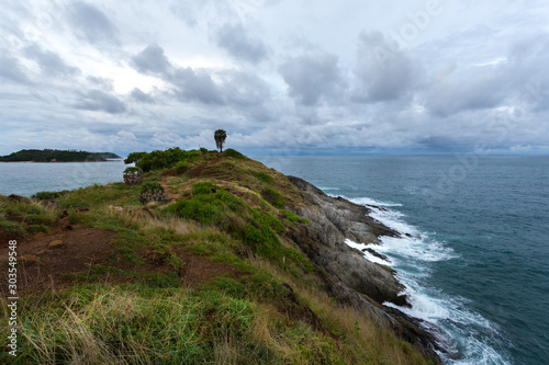 Rocky coast of the cape in the Andaman Sea, landscape in cloudy weather