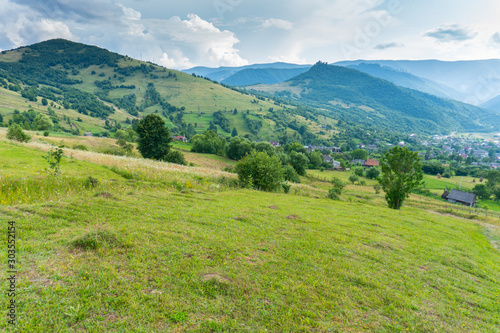 Beauty view on valley with village between mountains