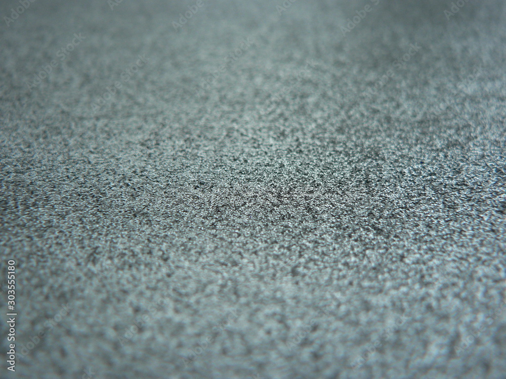 Festive silver glitter background. Textured background for holiday gift box, wedding or birthday greeting cards, present wrap design decoration. Festive silver glitter background. Textured background for holiday gift box, wedding or birthday greeting cards, present wrap design decoration.