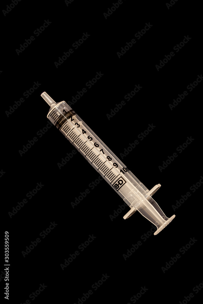 10ml syringe on black background 10ml syringe on black background