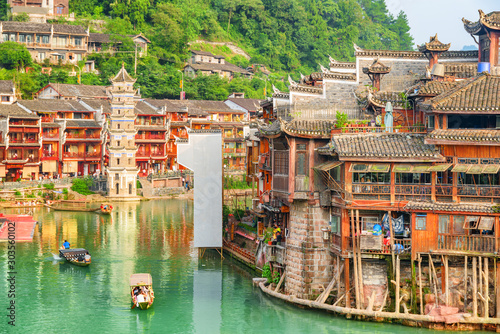 Amazing view of wooden tourist boats on the Tuojiang River photo