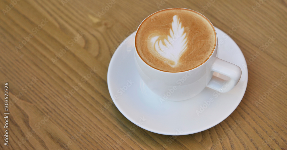 Cup of coffee on wooden background. Cup of coffee on wooden background.