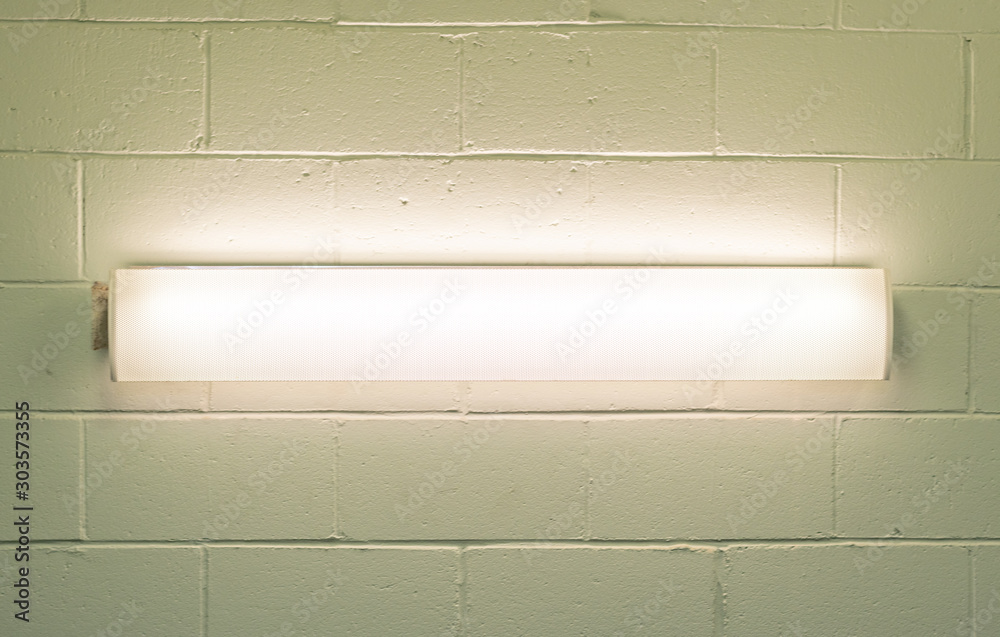 Obraz na plátně Wall light on cinderblock
