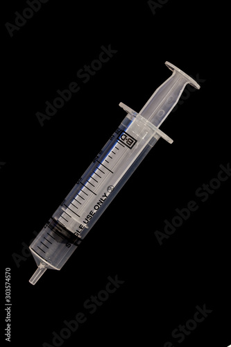20ml Syringe on black background photo