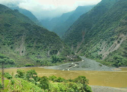 Nujiang valley. The Nujiang (known as the 'Salween' in Myanmar; its name in Chinese means ‘Raging River’) is the second-longest river in Southeast Asia and a Unesco World Heritage Site. photo