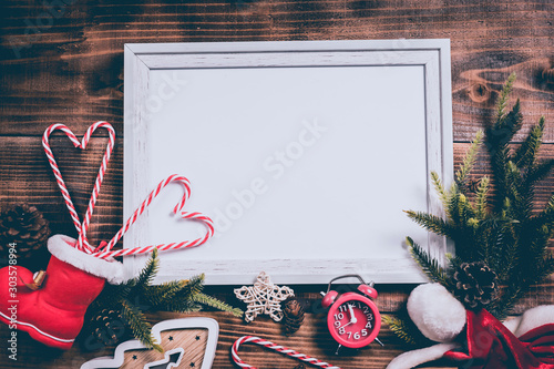 Merry Xmas and Happy New Year. Winter season holiday with Christmas decoration and photo frame background