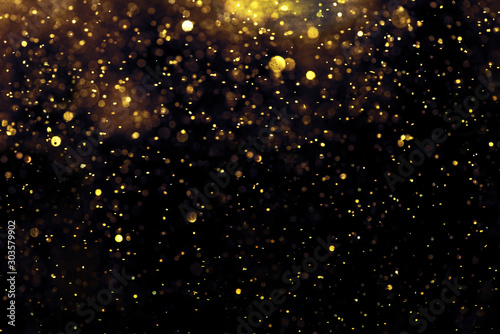golden glitter bokeh lighting texture Blurred abstract background for birthday  anniversary  wedding  new year eve or Christmas