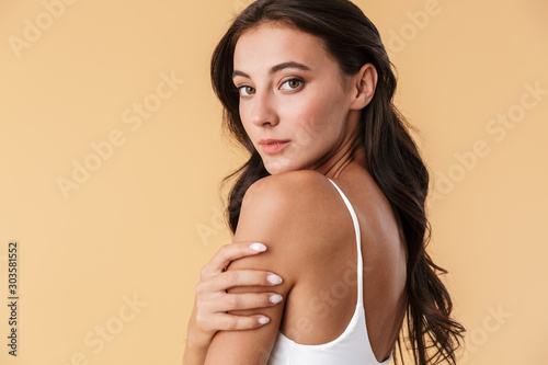 Fotografija Pretty young woman in swimwear posing isolated