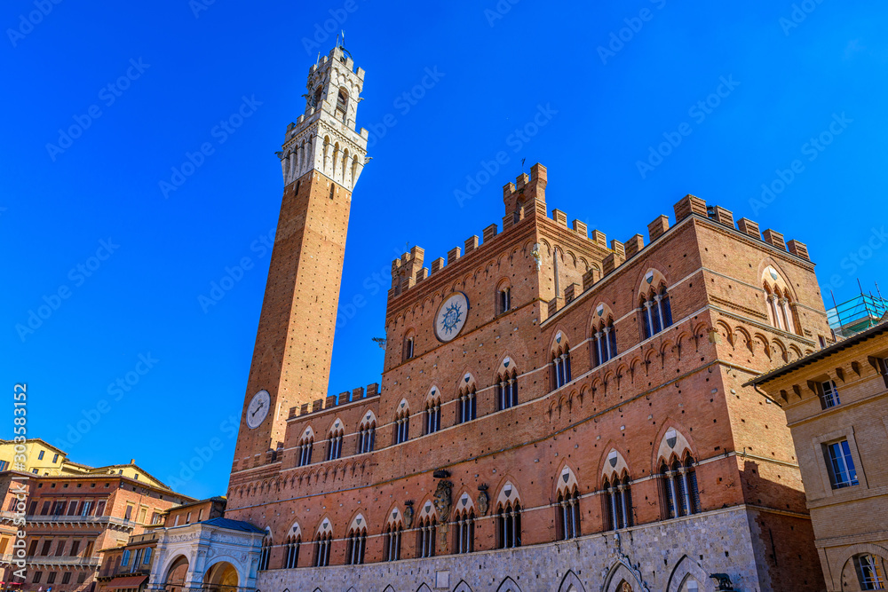 Palazzo Pubblico and Mangia Tower (Torre del Mangia) in Siena, Tuscany, Italy