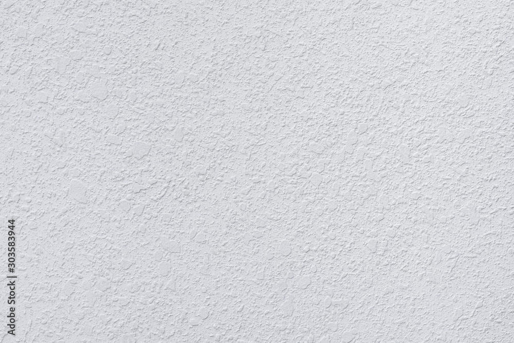 White concrete wall texture background. White concrete wall texture background.