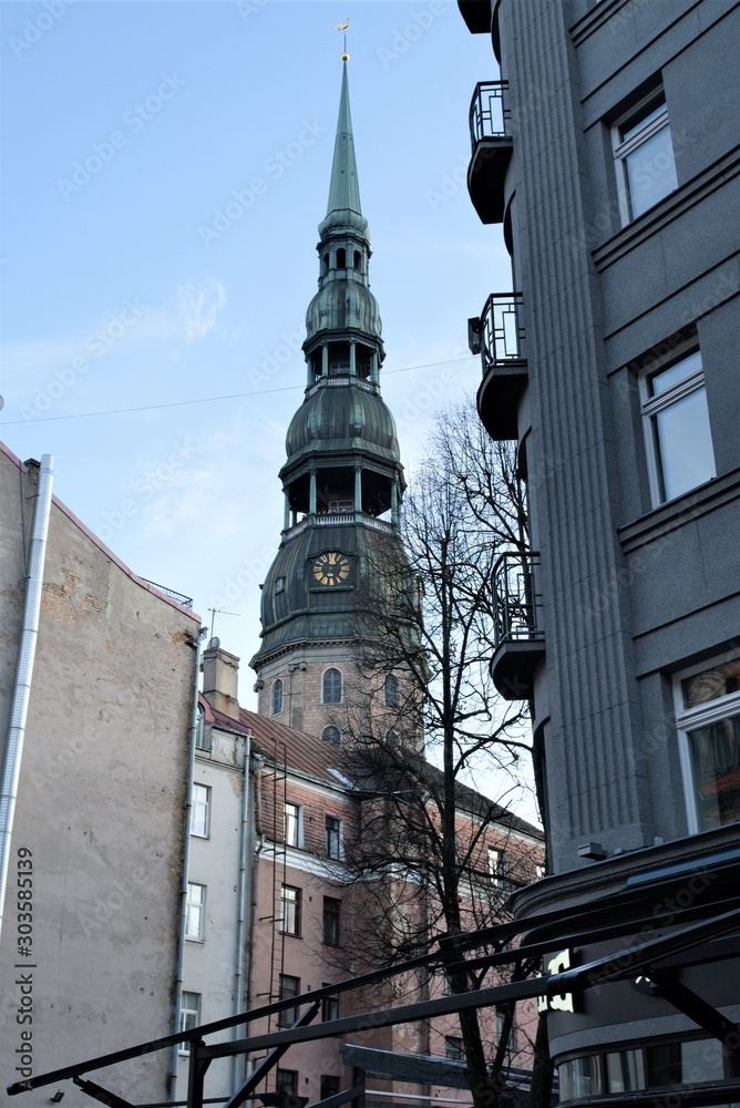Obraz premium Riga, Latvia, November 2019. Cityscape with the spire of the Cathedral of St. Michael.
