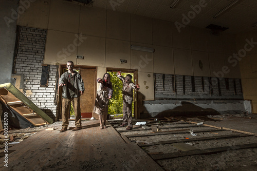 Zombies attack in an abandoned dark building