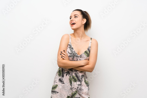 Young woman over isolated white background happy and smiling © luismolinero