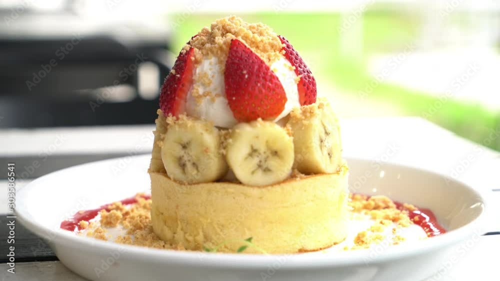 hot cake with cream, strawberry, banana and cookie crumble hot cake with cream, strawberry, banana and cookie crumble