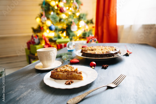 Panforte di Siena, Italian Christmas treat Gluten free christmas nut cake on a gray table with christmas decorations photo