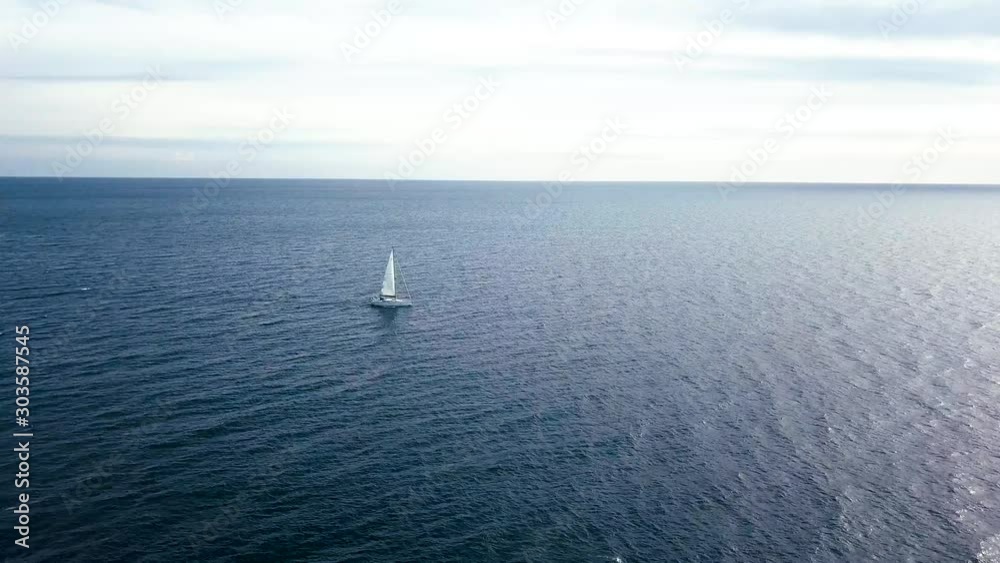 Aerial view of sailing ship yacht at deep blue sea in Italy, 4k Aerial view of sailing ship yacht at deep blue sea in Italy, 4k